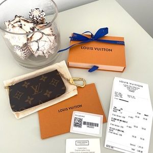 Authentic Louis Vuitton Monogram Key Pouch.